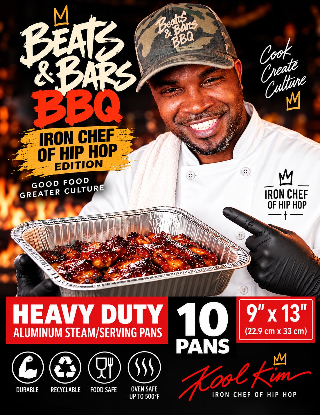 Kool Kim in a chef&rsquo;s coat and Beats & Bars BBQ cap smiles and points at a foil pan of glazed barbecue, on the Iron Chef of Hip Hop Edition pans promo.