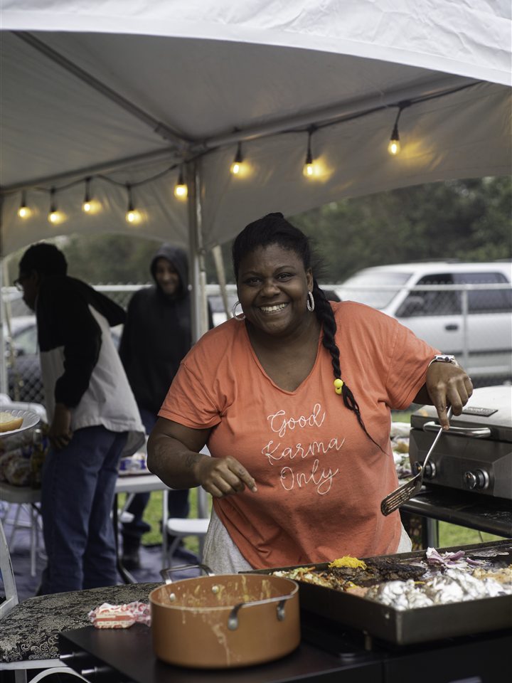 Cooking under the string-lit tent, 2023.